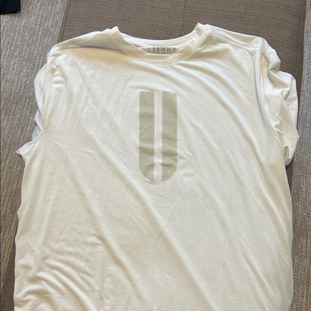 NOBULL Ivory Tee with Subtle Gray Design